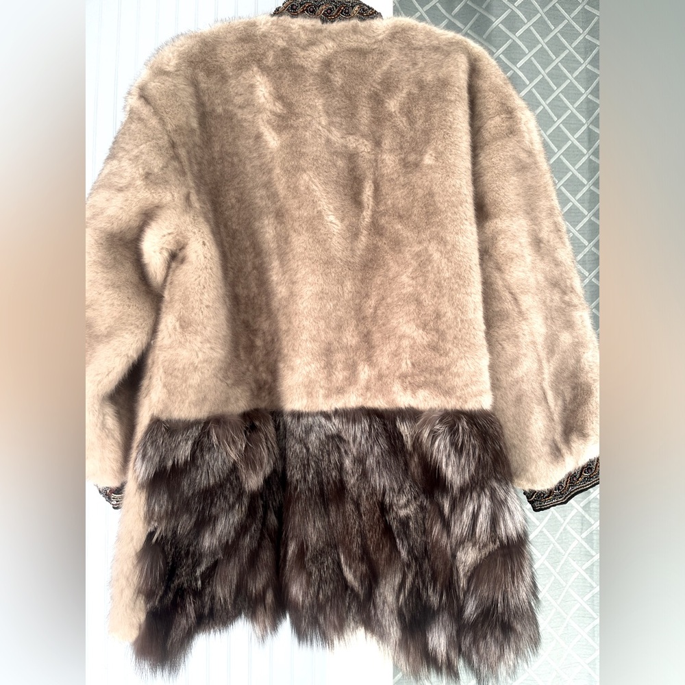 Faux fur coat with embroidery and silver fax tail fur